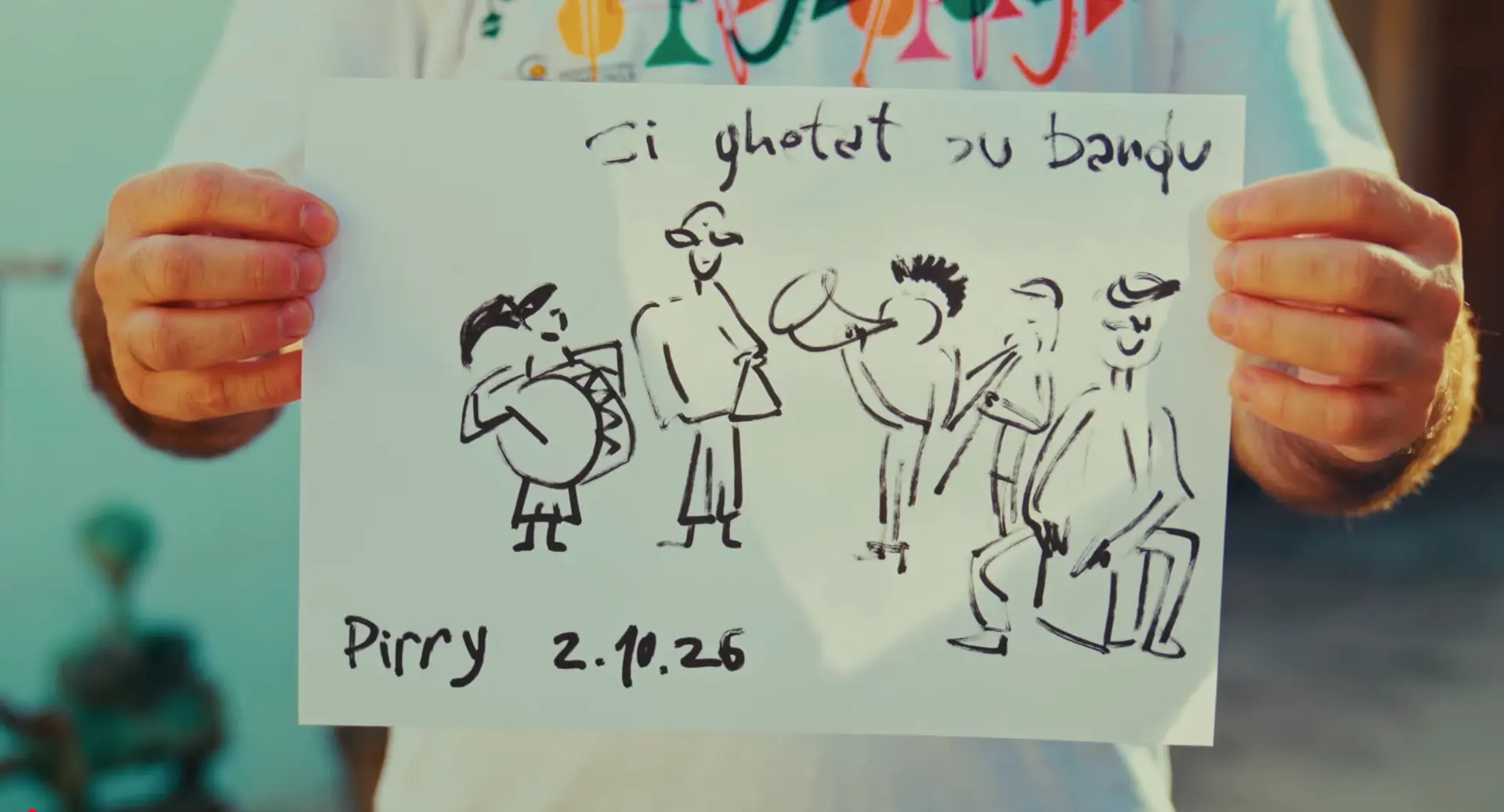 Frame dal documentario: disegno a mano di una band su un foglio